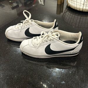 Women’s Nike black/white Cortez sneakers